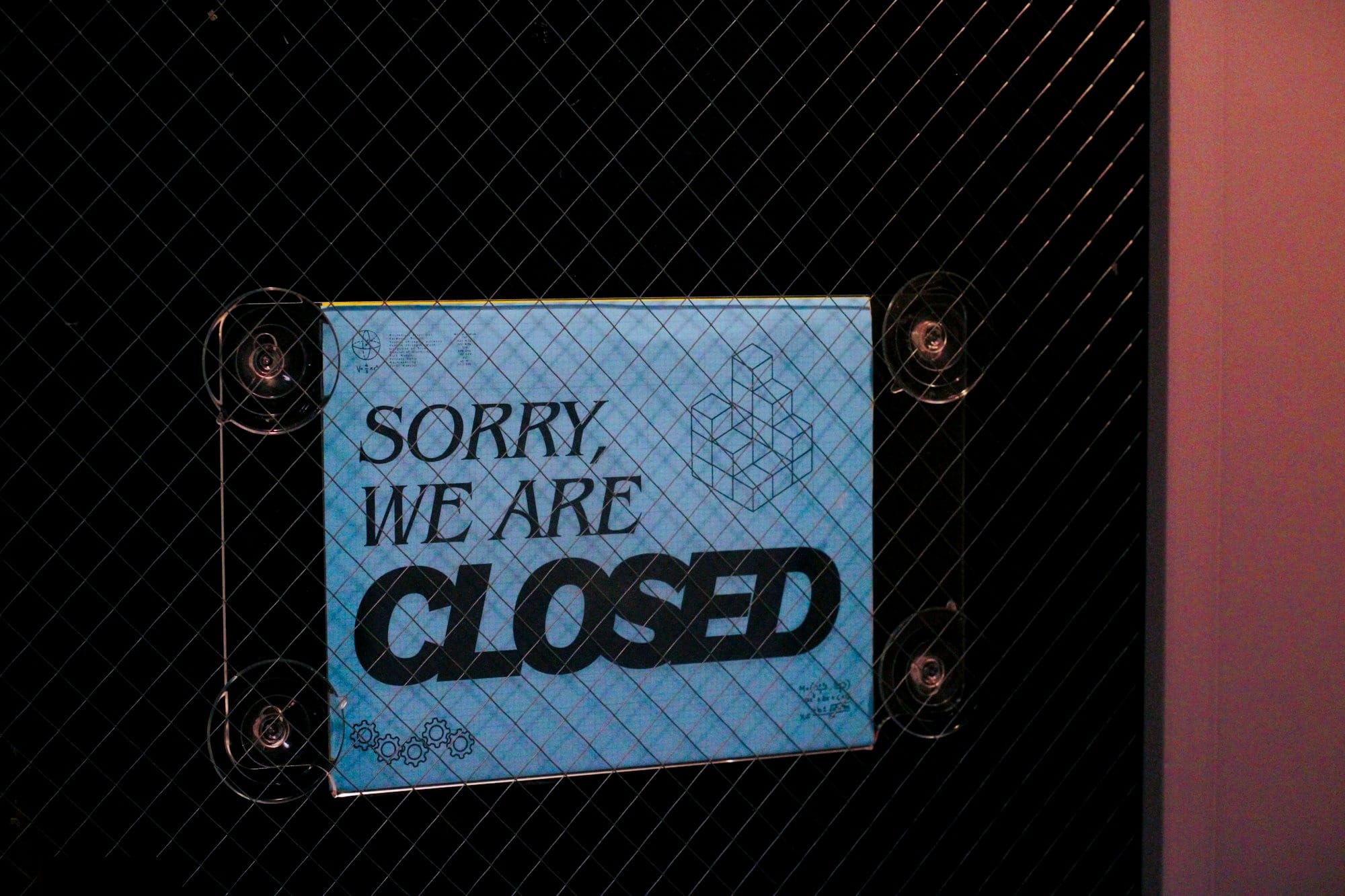 A sign reads "sorry, we are closed".