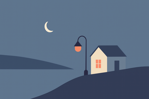 A small house on a hill at nighttime near a lake, with a lantern nearby.